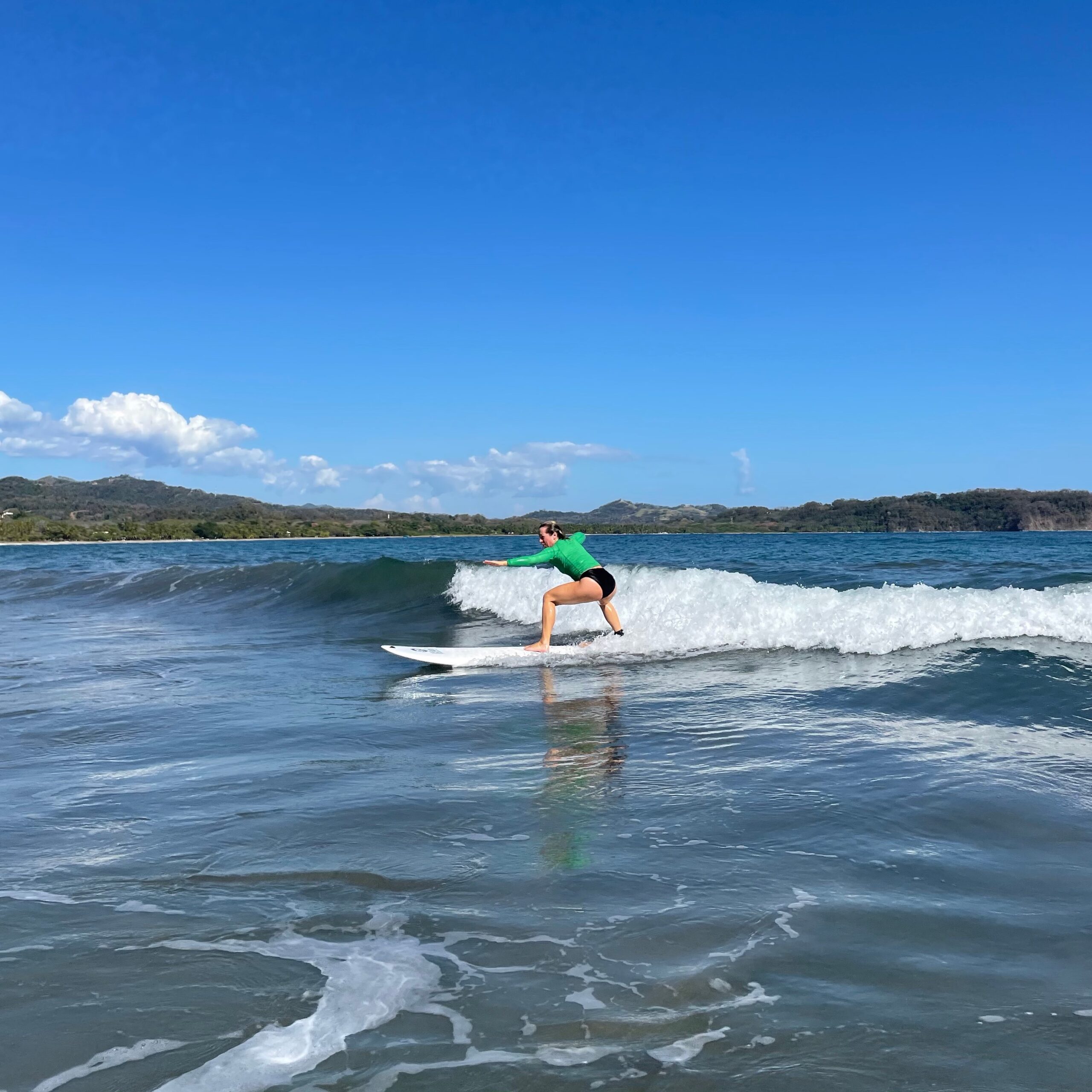 Paige learns to surf in Costa Rica