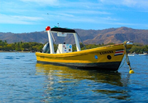 Yellow Witch's Rock boat trip panga is ready to take surfers to one of the most famous surf spots in Costa Rica: Roca Bruja!