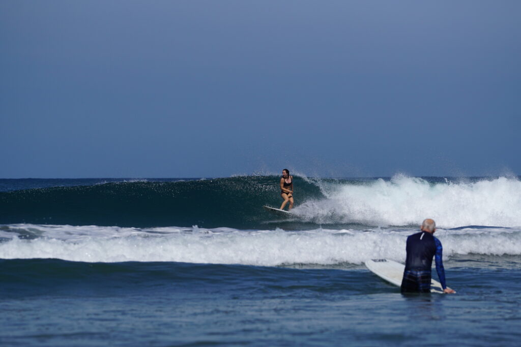 Surfer girl at Costa Rica Surf Trip Guiones Nosara Surf & Yoga