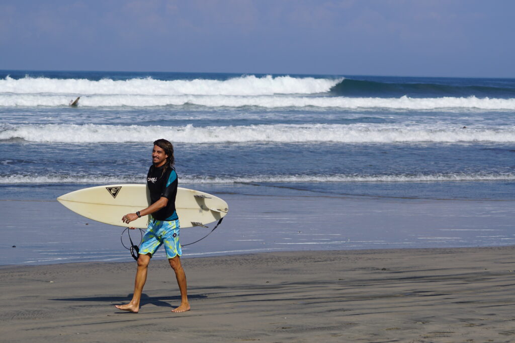 Happy surfer Marcelo Moran in Guiones