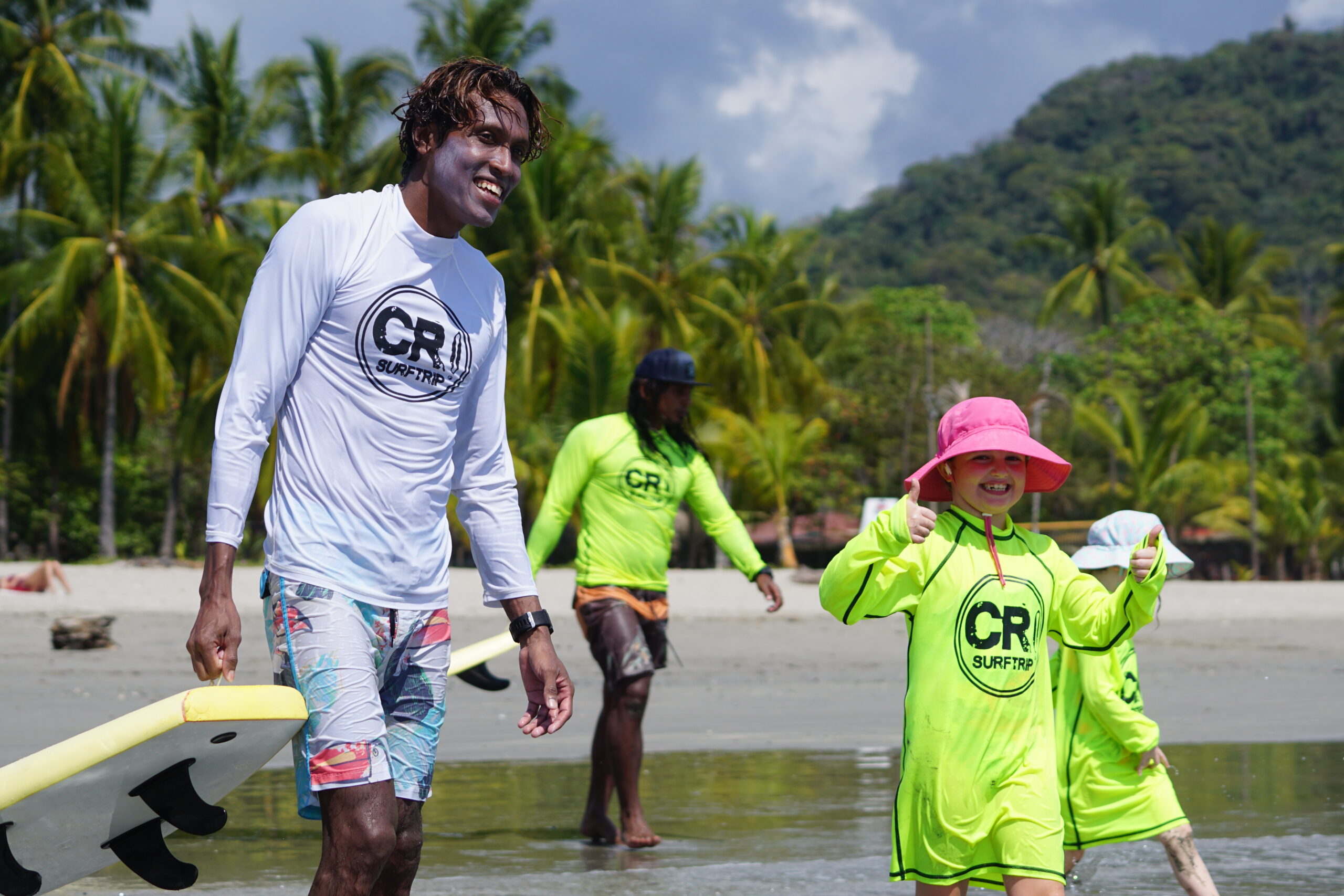 Kids take a Surf Lesson with Costa Rica Surf Trip instructors and director of surf, Jairo Zuniga or join a Surf camp for families