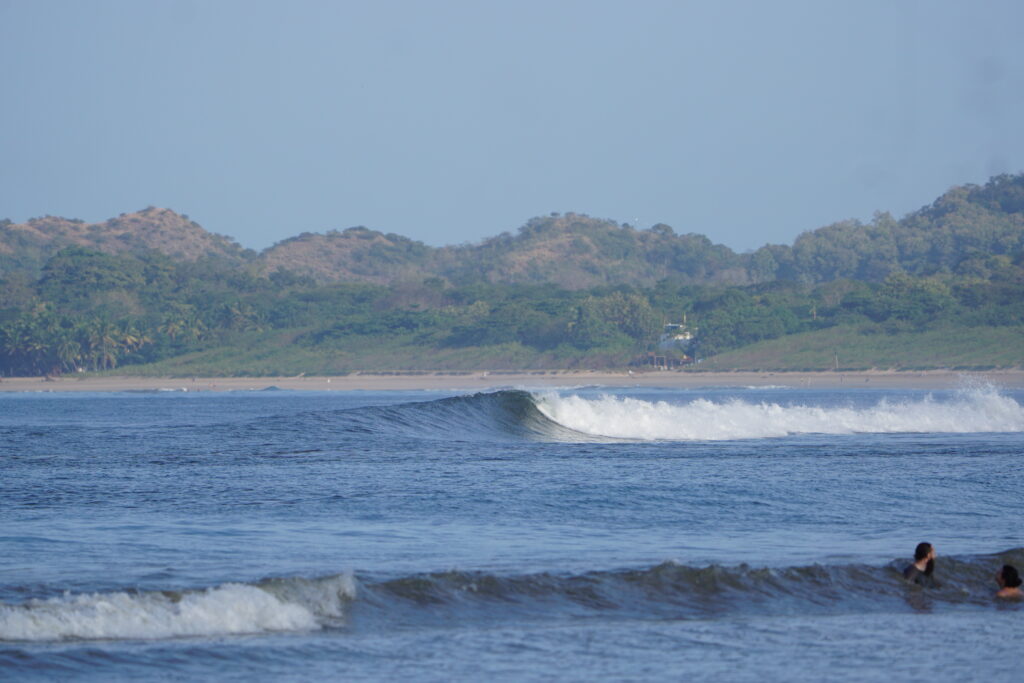 Wave in Tamarindo during surf yoga golf relax vacations